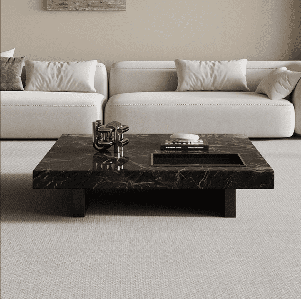 Cận cảnh bàn trà Minotti với mặt đá cẩm thạch vân mây và chi tiết viền kim loại sắc sảo